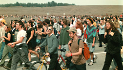 Photo of 
students marching through campus