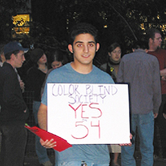 student with sign