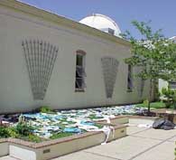 [Photo of t-shirts drying  in the courtyard after the fire in the gift shop at Lick Observatory]
